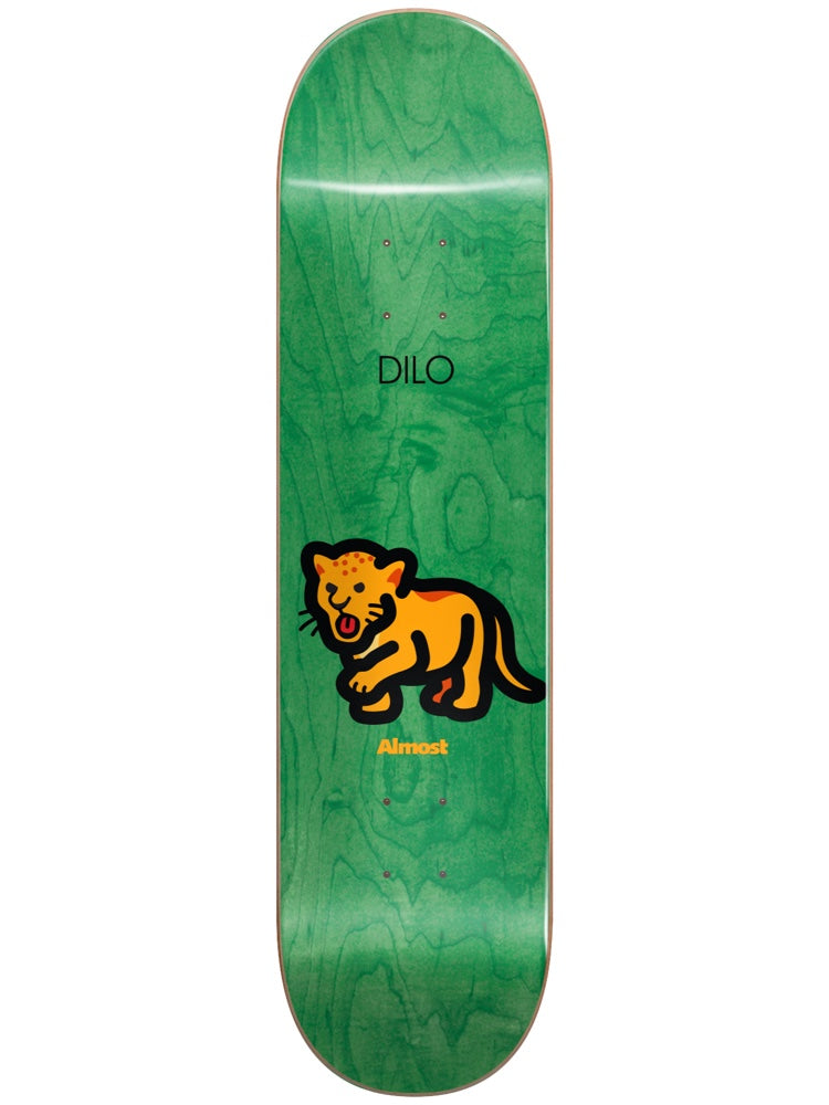Almost Dilo Mean Pets Impact Light 8.5 skateboard deck: Simple cartoon of a roaring orange spotted cub or big cat with thick black outline, on a green wood-stained deck. 'Dilo' printed above and the Almost name in orange below.