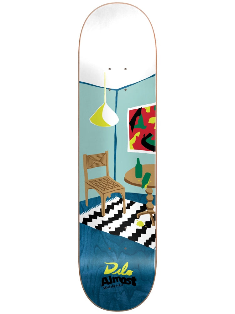 Almost Dilo Rooms Super Sap R7 8.125 & 8.375 skateboard deck: Flat, painted illustration of a room corner with a wooden chair, zigzag rug, round table with green bottles, yellow pendant lamp and a red and green abstract picture, on pale blue walls and a blue-stained floor.