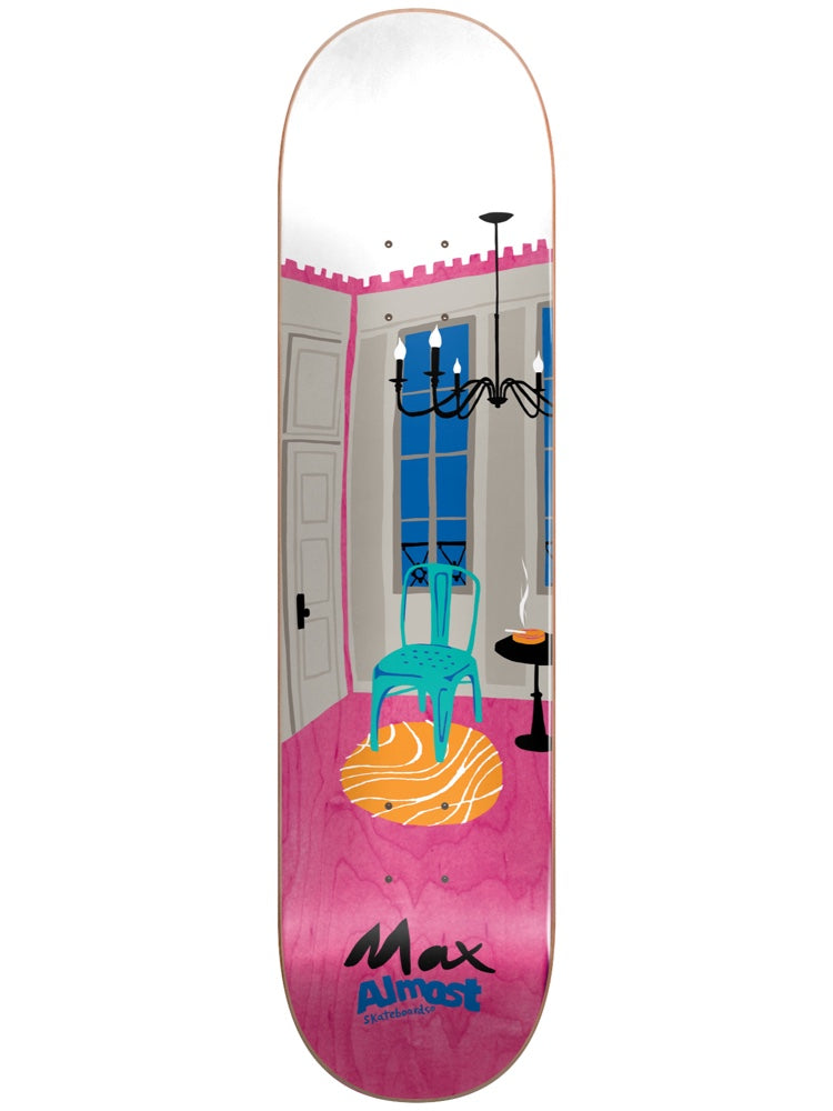 Almost Max Rooms Super Sap R7 8.25 & 8.5 skateboard deck: An illustrated empty room with a teal chair on an orange rug, a black chandelier, tall blue-paned windows and a small table with a steaming cup, over a pink floor. MAX and the Almost logo are lettered at the bottom.