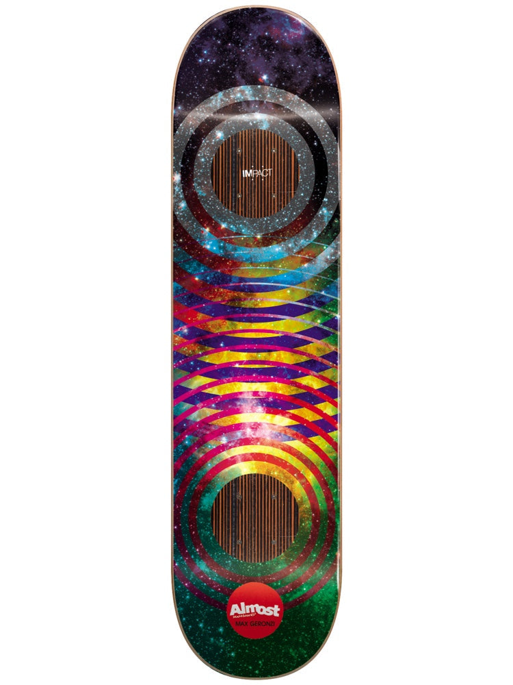 Almost Max Space Rings Impact 8 skateboard deck: A galaxy star-field background with grey concentric rings at the nose and tail and interlocking rainbow-coloured ring arcs between them, with a red Almost logo dot at the tail.