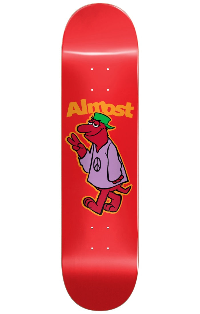 Almost Peace Out RED 8.125 skateboard deck: Cartoon red furry monster in a green bucket hat and lilac poncho with a peace symbol, flashing a peace sign. Orange Almost logo above, on a glossy red deck.