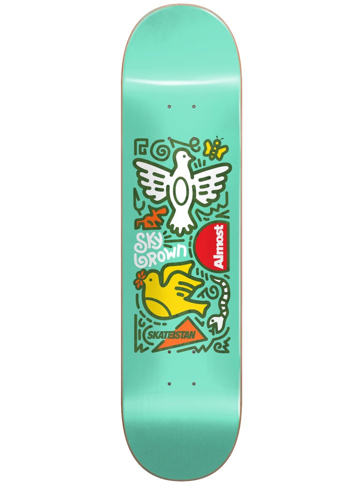 Almost Skateistan Sky Doodle R7 Mint 7.75 skateboard deck: Doodle-style line drawings of a white dove, a yellow dove with a flower, a butterfly and a snake sit in a green outlined panel on a mint ground. The Almost logo and the Skateistan name appear in the panel.
