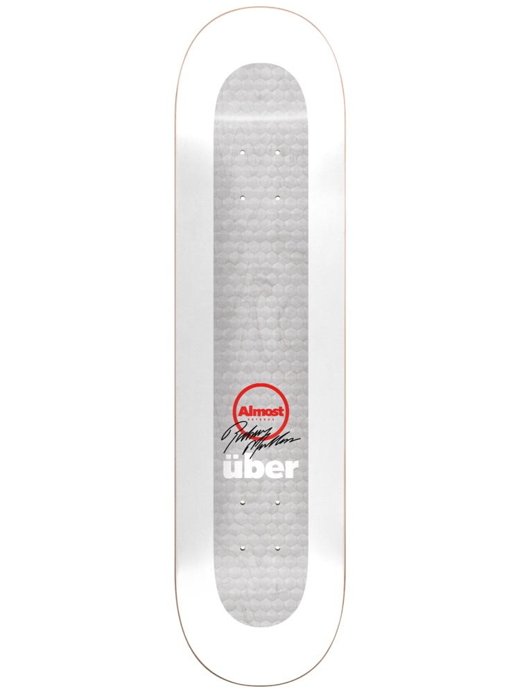 Almost Uber White skateboard deck: Plain white deck with a grey honeycomb-textured central panel, a red circular Almost logo with a black signature, and 'über' in white lettering.