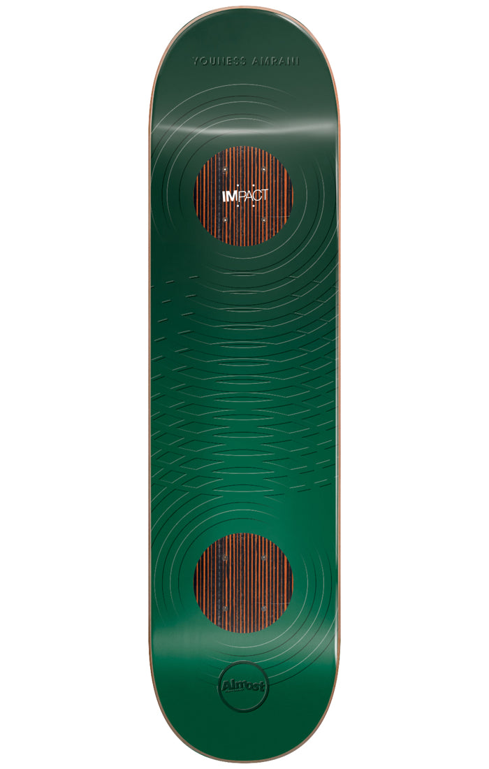Almost Youness Raised Rings Impact 8.375 skateboard deck: Dark green deck with embossed concentric ring ripples radiating from two circular wood-veneer patches near each end. Impact label on the upper circle and small Almost circle logo at the tail.