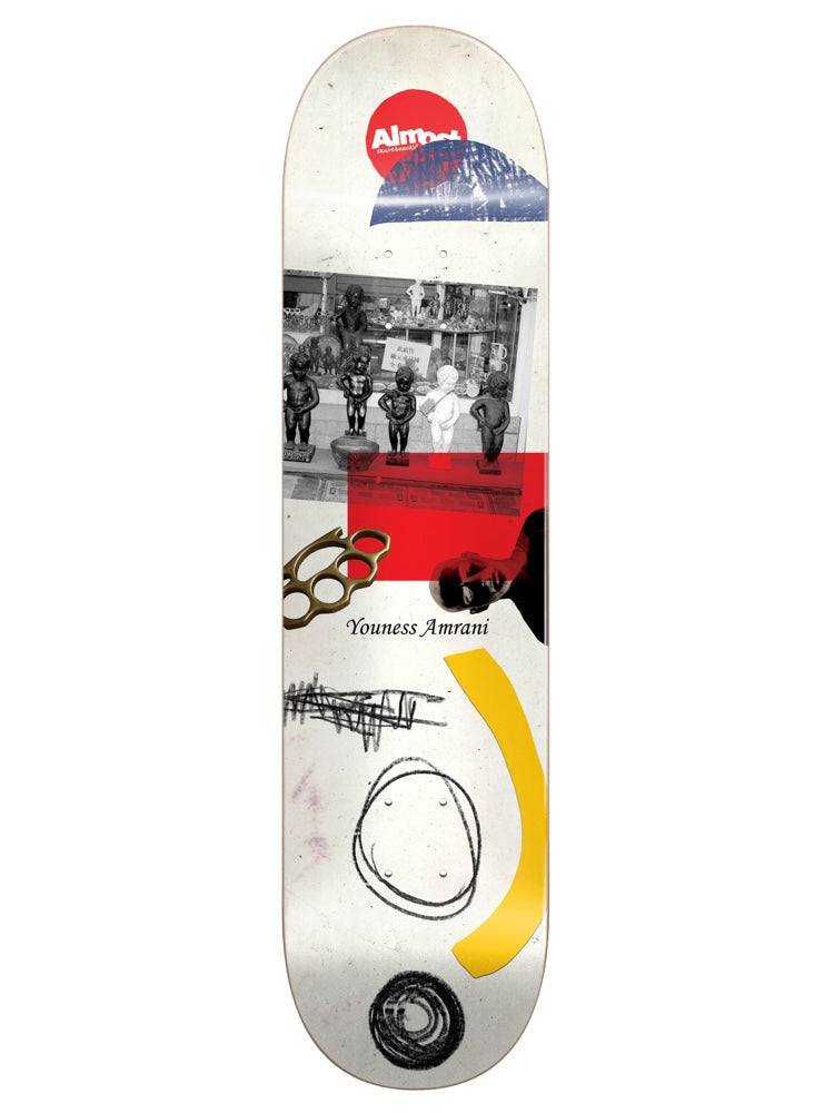 Almost Youness Scraps R7 skateboard deck: Collage on a white deck: a black and white photo of small fountain statues in a shop window, brass knuckles, a red block, a dark portrait fragment, scribbles, a yellow arc and a red Almost logo circle.