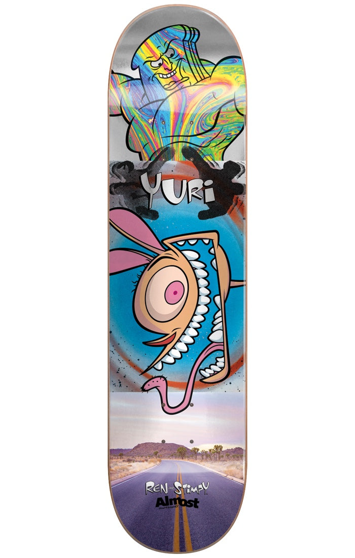 Almost Yuri Ren & Stimpy Road Trip R7 8.0 & 8.375 skateboard deck: Collage of Ren and Stimpy cartoon: a rainbow holographic Stimpy at the top, YURI in graffiti lettering, Ren's wide-eyed screaming face on a blue swirl, and a desert road photo at the bottom, on silver foil.