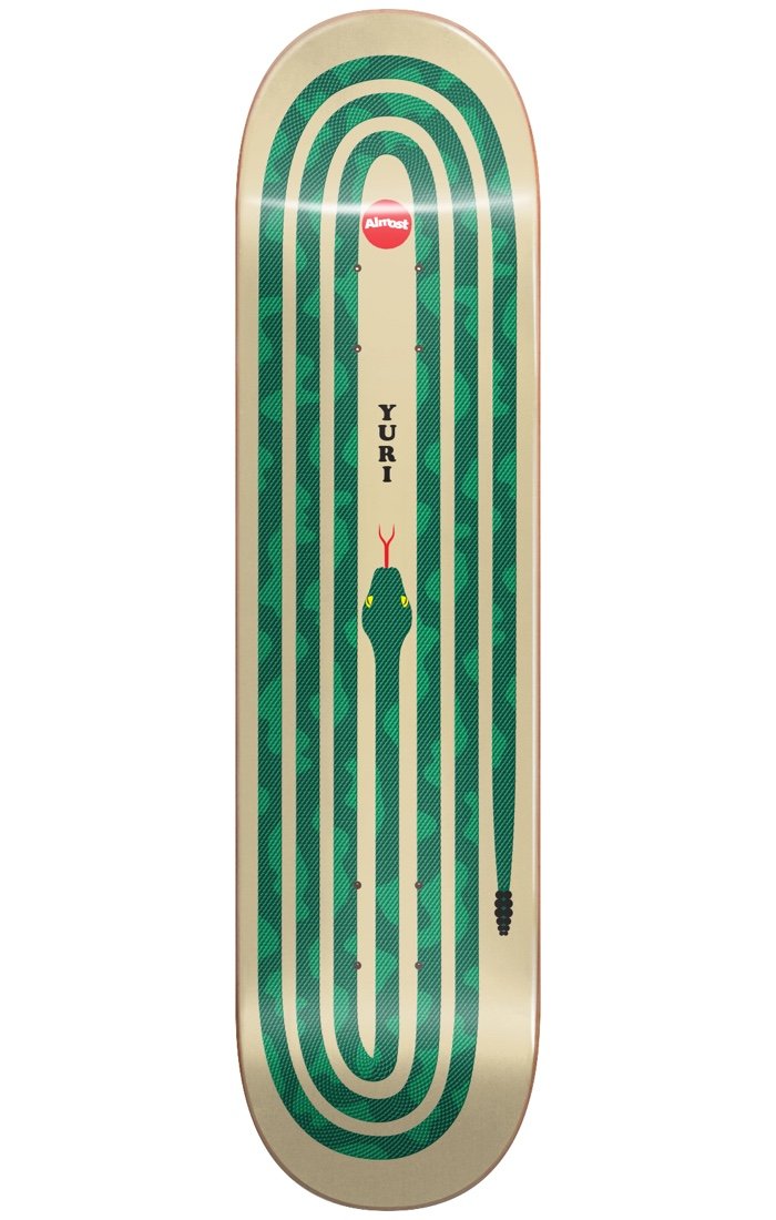 Almost Yuri Snake Pit R7 Green 8.375 skateboard deck: Cream deck with a green snake coiled in concentric lines along its length, head with red tongue near the centre and a rattle at the tail, with the rider name and an Almost logo.