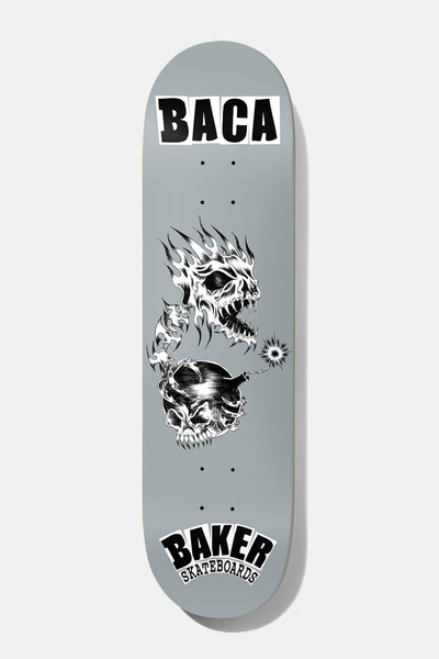Baker Baca Bic Lords 8.475 skateboard deck: Black-and-white drawing of a flaming screaming skull above a skull-shaped bomb with a lit fuse, on a grey deck. BACA in cut-out letter style at the top and Baker Skateboards logo at the bottom.