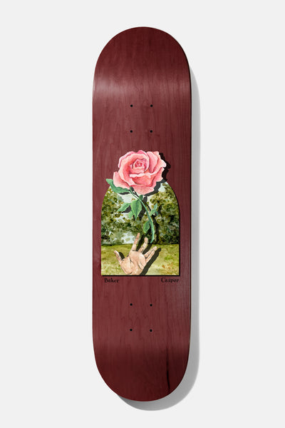 Baker Casper Seasons B2 8.25 skateboard deck: Painted pink rose with green stem rising above an open hand in a grassy park, shown within an arched window panel on a dark red-stained deck. Small Baker and Casper names below.