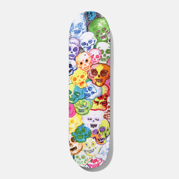 Baker Hawk Rainbow Skulls 8.0 skateboard deck: Dense crowd of hand-drawn, crayon-style skulls in many bright colours covering the whole deck, each with a different expression, on a white background.