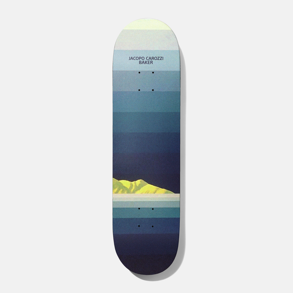 Baker Jacopo Classic 8.25 skateboard deck: A minimalist landscape in horizontal bands fading from pale yellow-green at the nose through blues to dark navy, with a small yellow-green hill silhouette and its reflection near the tail. Small rider and brand text at the top.
