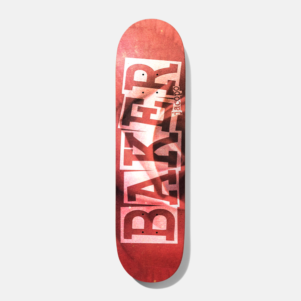 Baker Jacopo Ribbon Time Flies 8.38 skateboard deck: Red-toned deck with large white blocky BAKER lettering in the ribbon style, doubled and offset, over a blurred red photographic texture. Small jacopo text runs up the right side.
