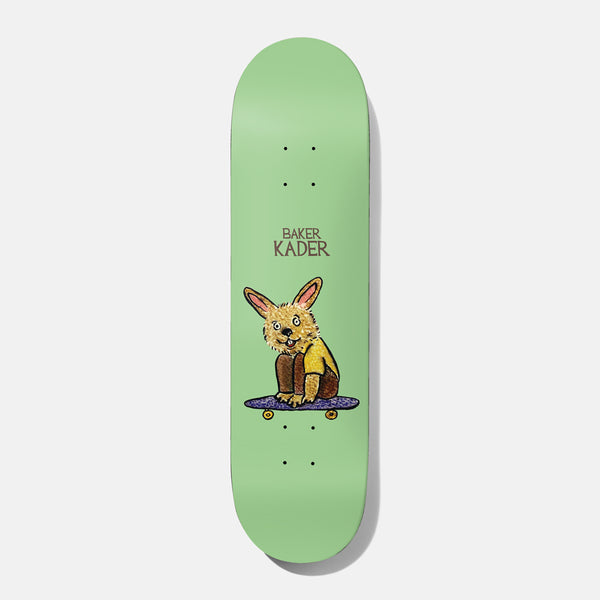 Baker Kader Our Furry Friends B2 8.38 skateboard deck: Crayon-style drawing of a fuzzy brown rabbit in a yellow top sitting on a purple skateboard, on a pale green deck with 'BAKER KADER' in brown above.