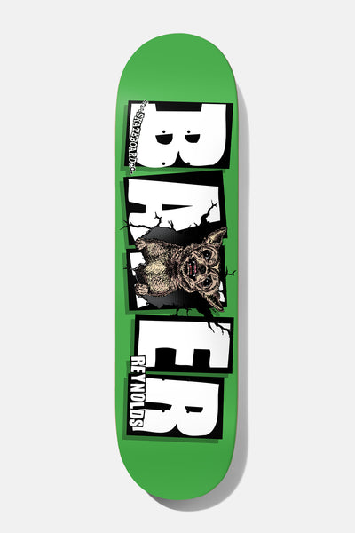 Baker Reynolds Emergers 8.25 skateboard deck: A snarling dog creature bursts through a cracked hole in the middle of large white block Baker lettering on a green deck, with 'REYNOLDS' lettered by the lower letters.