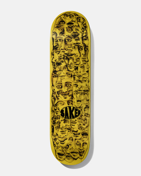 Baker Hawk Nozzle Clog 8.125 skateboard deck: A dense crowd of airbrushed black-on-yellow faces with exaggerated expressions packed into one tall mass down the deck, with a small oval Baker logo near the bottom.