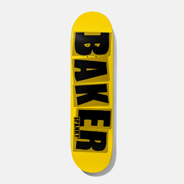 Baker Spanky Brand Name Yellow/Black B² 8.25 skateboard deck: The Baker logo in large black block capitals on a yellow deck, each letter on its own slightly offset olive tile, with SPANKY in small capitals beside the R.
