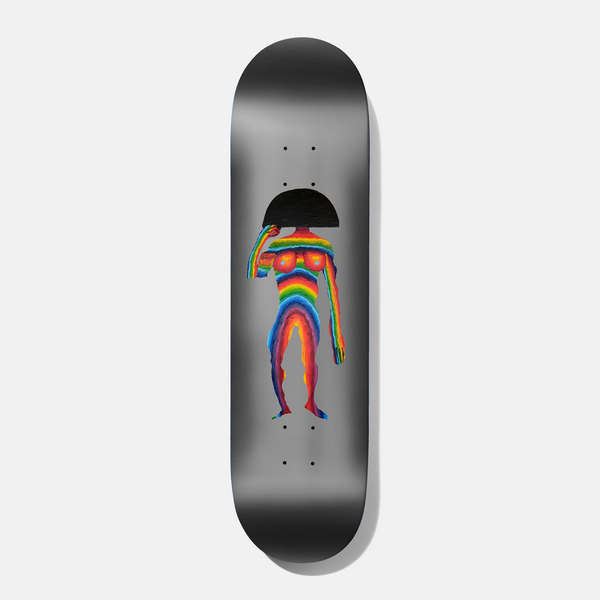 Baker Spanky Ty Segall 8.0 skateboard deck: Rainbow-striped standing figure with a black half-dome shape for a head, one arm raised, on a grey gradient deck.
