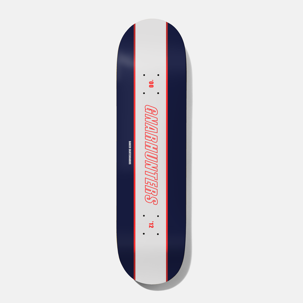 Baker Steamer Gnarhunters X Baker 8.25 skateboard deck: Navy deck with a central white stripe edged in red, carrying the red outlined italic word Gnarhunters running down it, with 00 and 12 date marks and a tiny Baker Skateboards line.
