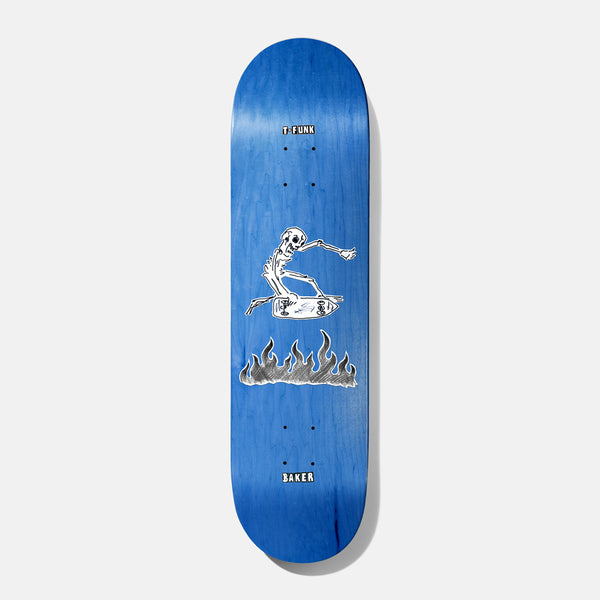 Baker T - Funk Cremation Mayhem 8.125 skateboard deck: A white skeleton rides a coffin-like board through the air above a row of hatched flames, drawn in simple black line work on a blue stained deck. The rider's name sits at the nose and Baker at the tail.