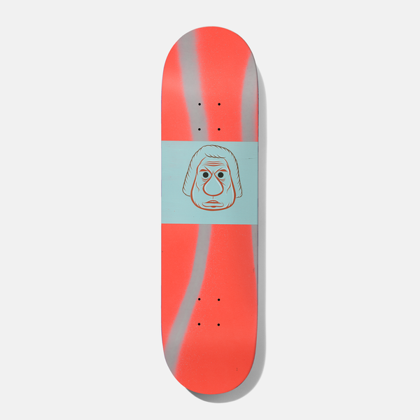 Baker Theotis Barry 8.3875 skateboard deck: A line-drawn cartoon face of a stern older man with white hair, set in a pale blue band across the middle of the deck. The ends are sprayed in fluorescent red-orange with grey streaks.
