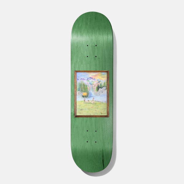 Baker Tyson Woodland Escape 8.125 skateboard deck: Framed painting of a colourful mountain landscape with a waterfall, lake and meadow with small figures and animals, set in a wooden frame on a green stained deck.