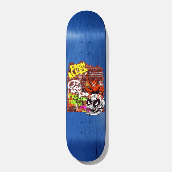 Baker Zach Allen Goon Wall skateboard deck: Brick wall covered in neon graffiti and tags, with a red devil figure perched on a large white skull with fangs. Rider name sprayed in yellow at the top, on a blue stained deck.