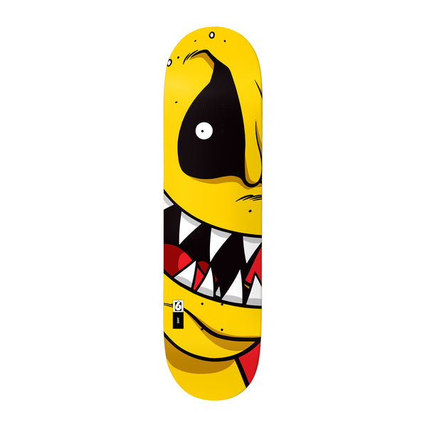 Birdhouse Jaws Yukmouth XL 8.475 skateboard deck: Cropped close-up of a grinning yellow cartoon monster with one huge black eye and a mouth of sharp white teeth and red tongue, filling the deck.