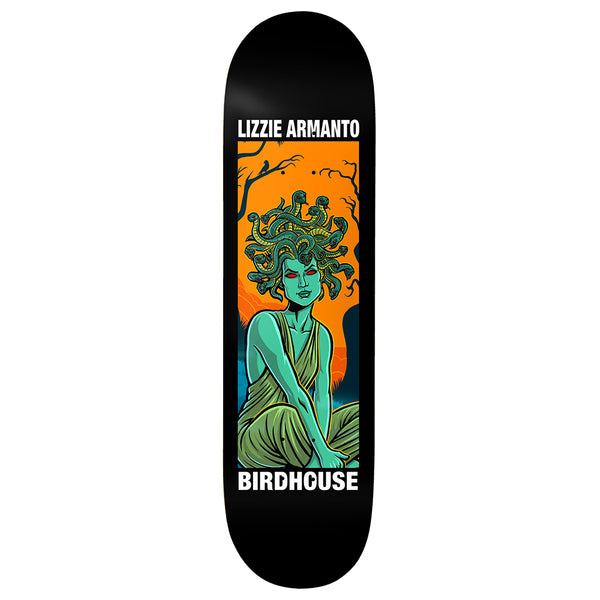 Birdhouse Lizzie Armanto Second Life 8.25 skateboard deck: A green-skinned Medusa with red eyes and snakes for hair sits cross-legged in a draped robe against an orange sky and bare trees, inside a rectangular panel on a black deck. Rider and brand names appear above and below.