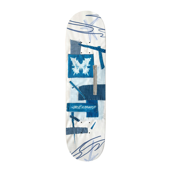 Birdhouse Lizzie Armanto Sewn 8.25 skateboard deck: Cream deck with stitched patchwork panels in shades of blue denim, one showing a white butterfly-like motif and another a grey zip, with blue scribbled linework at the ends.
