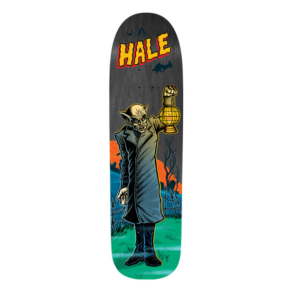 Birdhouse Shawn Hale Graveyard 8.75 skateboard deck: Nosferatu-style vampire in a long coat holds up a lantern in a graveyard with bare trees, bats and an orange moon. Yellow comic-style HALE lettering sits at the top of a grey-black shaped deck.