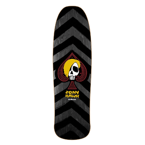Birdhouse Tony Hawk McSqueeb 9.375 skateboard deck: A blond-haired skull in a red spade on an old-school shaped deck with grey chevron stripes over black. Yellow rider name and small Birdhouse logo below.