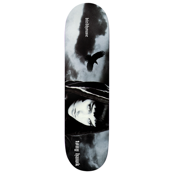 Birdhouse Tony Hawk Phantas 8.125 skateboard deck: Black and white photograph of a pale woman with dark fringe and hood looking out from a stormy sky, with a crow in flight above. Brand name and rider name in gothic lettering.