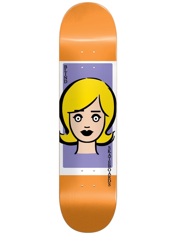 Blind Girl Doll Orange 8.375 skateboard deck: A simple cartoon doll's face with blonde hair, wide eyes and black lips sits in a lilac panel with white border across an orange deck. Blind Skateboards is written vertically either side.