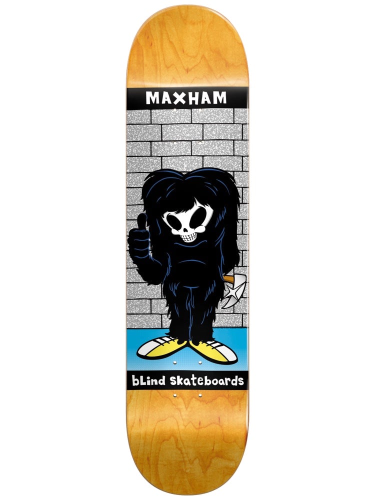 Blind Maxham Reaper Impersonator R7 8.375 skateboard deck: Cartoon Reaper figure in a hairy black Bigfoot-style costume holding an axe and giving a thumbs-up, standing before a grey brick wall. Black name banner at the top and 'bLind Skateboards' bar at the bottom.