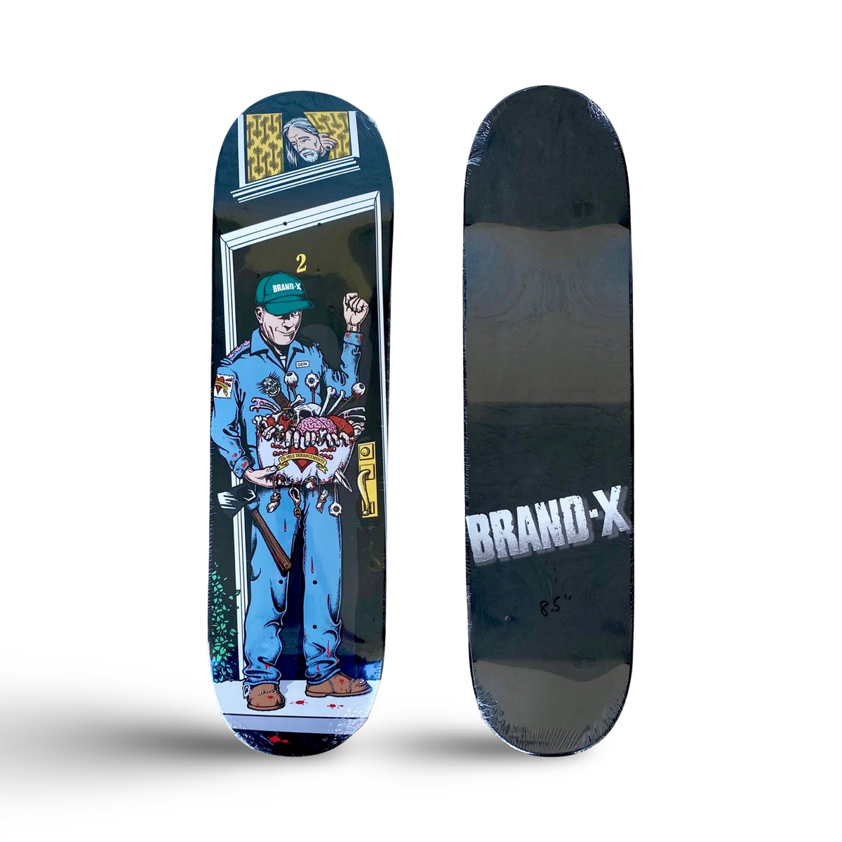 Brand-X Ed Gein 2 skateboard deck: A man in blue overalls and a cap standing in a doorway holding a bowl of organs and tools, with an axe beside him and a face watching from the window above. Brand-X logo on the black bottom of the second deck.