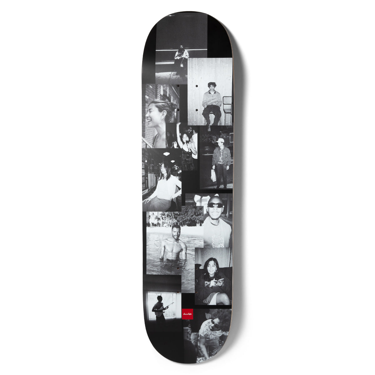 Chocolate Aikens Friends Of Carl Slick skateboard deck: A collage of overlapping black-and-white snapshots of friends and strangers: portraits, a man standing in water, a guitarist silhouetted in a window and a figure in sunglasses. A small red Chocolate logo sits at the tail on a black deck.