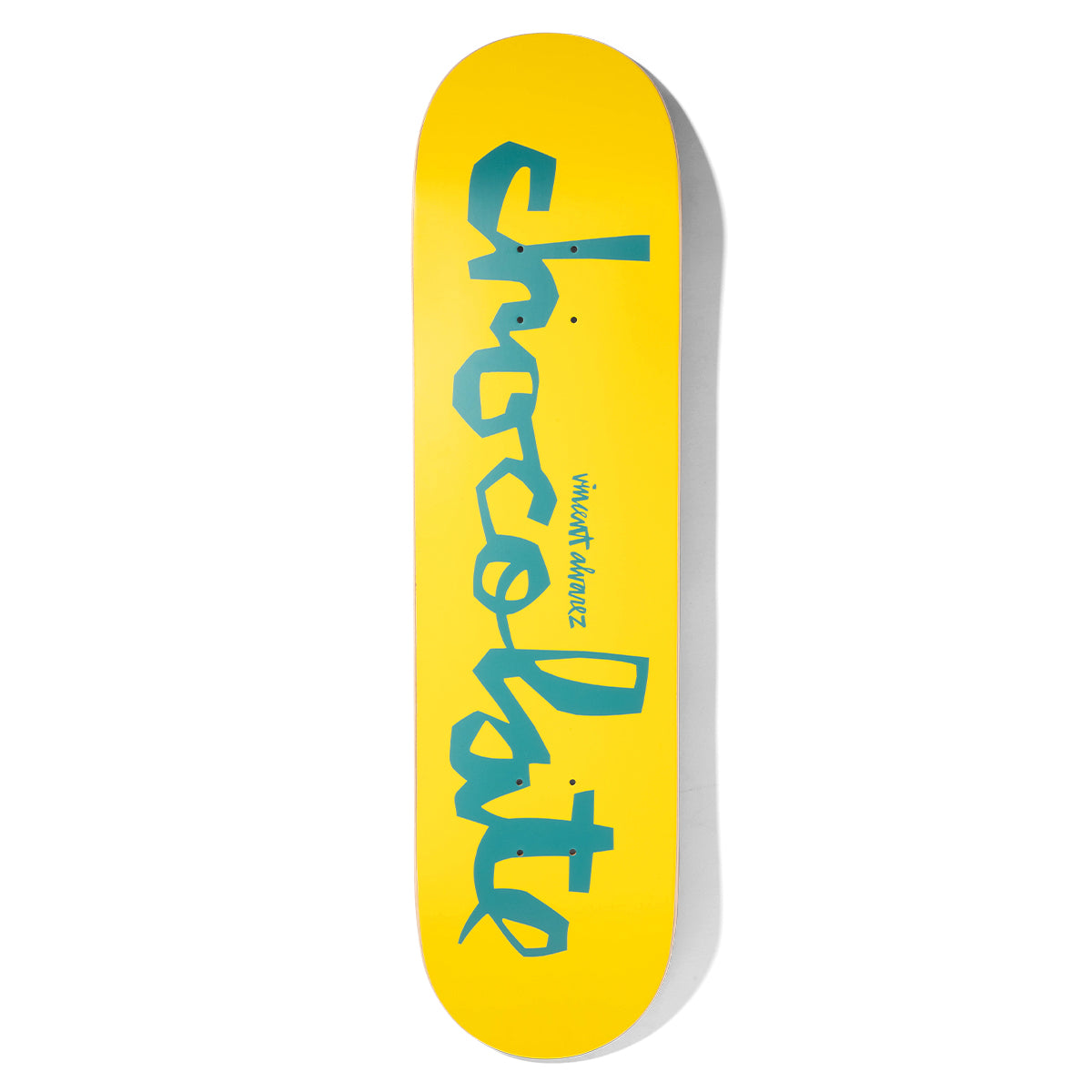 Chocolate Alvarez Original Chunk Pop Secret skateboard deck: Bright yellow deck with the Chocolate 'Chunk' logo in large teal hand-cut letters running the length of the board, and a small teal 'Vincent Alvarez' signature.