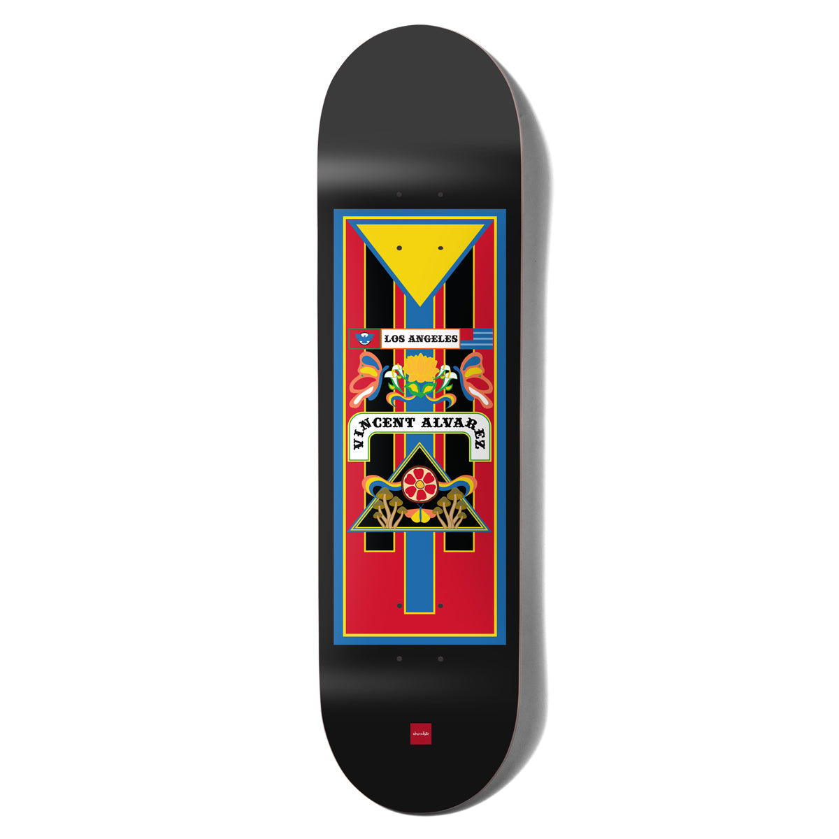 Chocolate Alvarez Trajineras skateboard deck: A rectangular decorative panel in red, blue, yellow and black with a yellow triangle, floral and bird motifs, a Los Angeles banner and the rider name on a curved scroll, set on a black deck.
