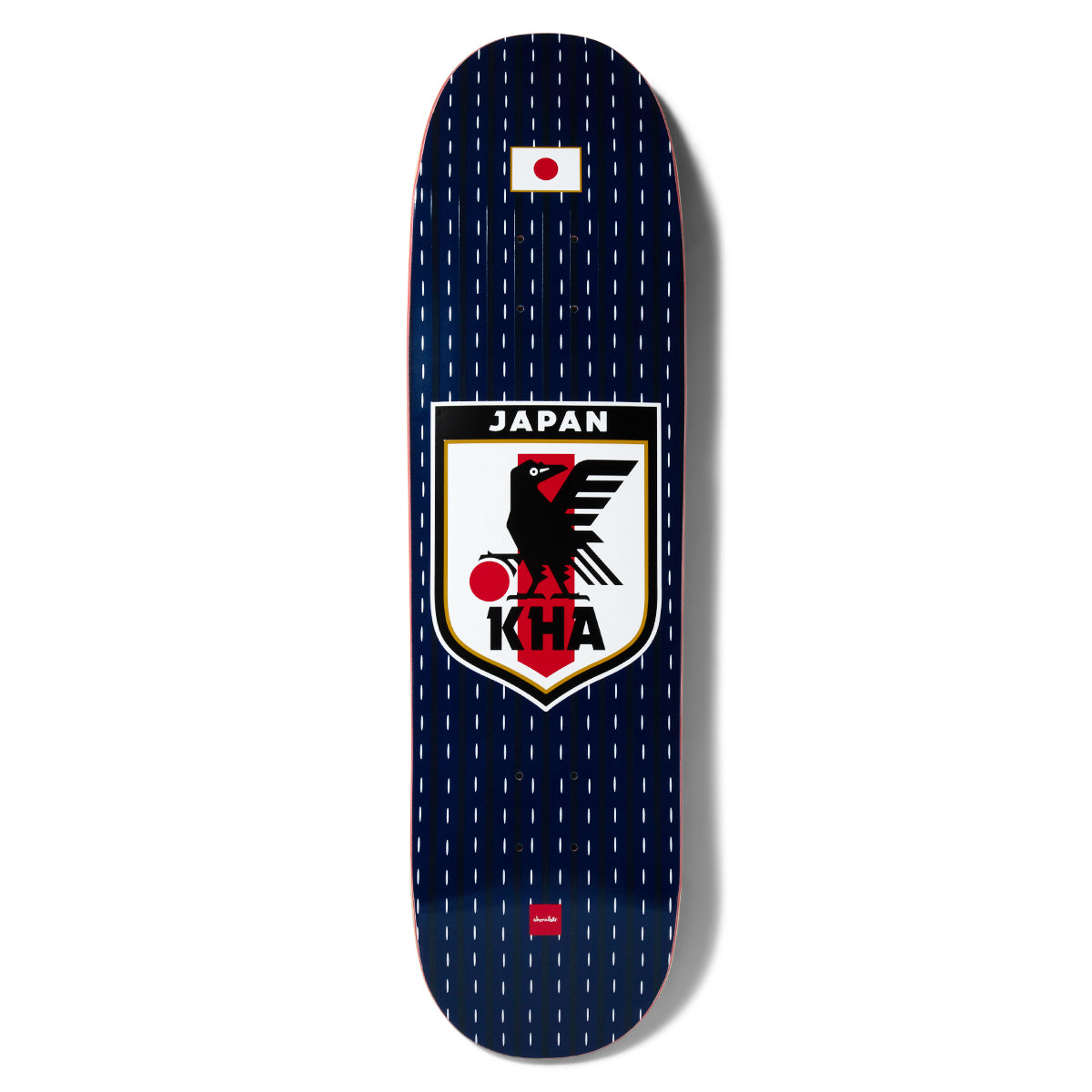 Chocolate Anderson Japan Sakkaa Skidul skateboard deck: Japan national football shirt parody: navy pinstripe background with a rising-sun flag at the top and a shield badge showing a black crow over a red sun, reading JAPAN with KHA beneath.