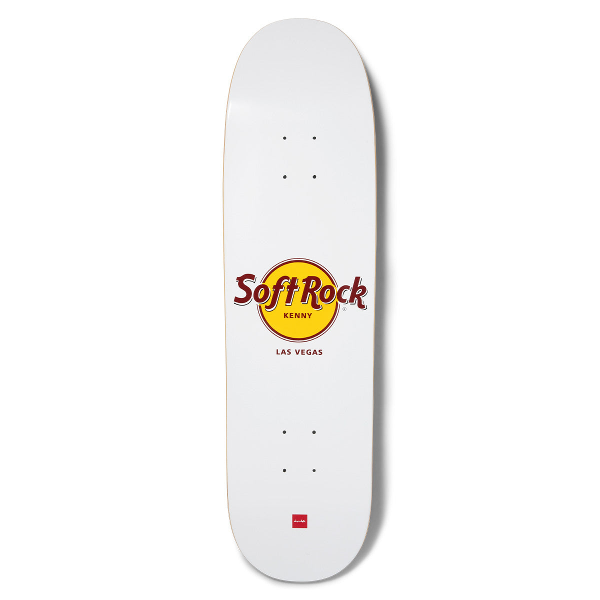 Chocolate Anderson Soft Rock Skidul skateboard deck: White shaped deck with a parody of the Hard Rock Cafe logo: a yellow circle and maroon lettering reading Soft Rock, with Kenny and Las Vegas. Small red Chocolate logo at the tail.