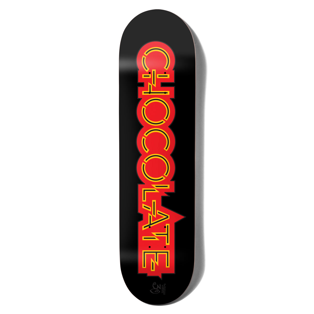 Chocolate Fernandez Parliament skateboard deck: The brand name is stacked vertically in large red capitals with a yellow inline, in a retro, neon-sign style, on a black deck. A small signature-style mark sits near the tail.
