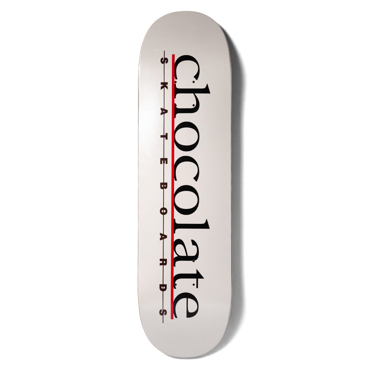 Chocolate Herrera Bar Logo skateboard deck: A white board with the word chocolate in large black serif lowercase running up the board, a red line beneath it and spaced SKATEBOARDS lettering beneath the line.