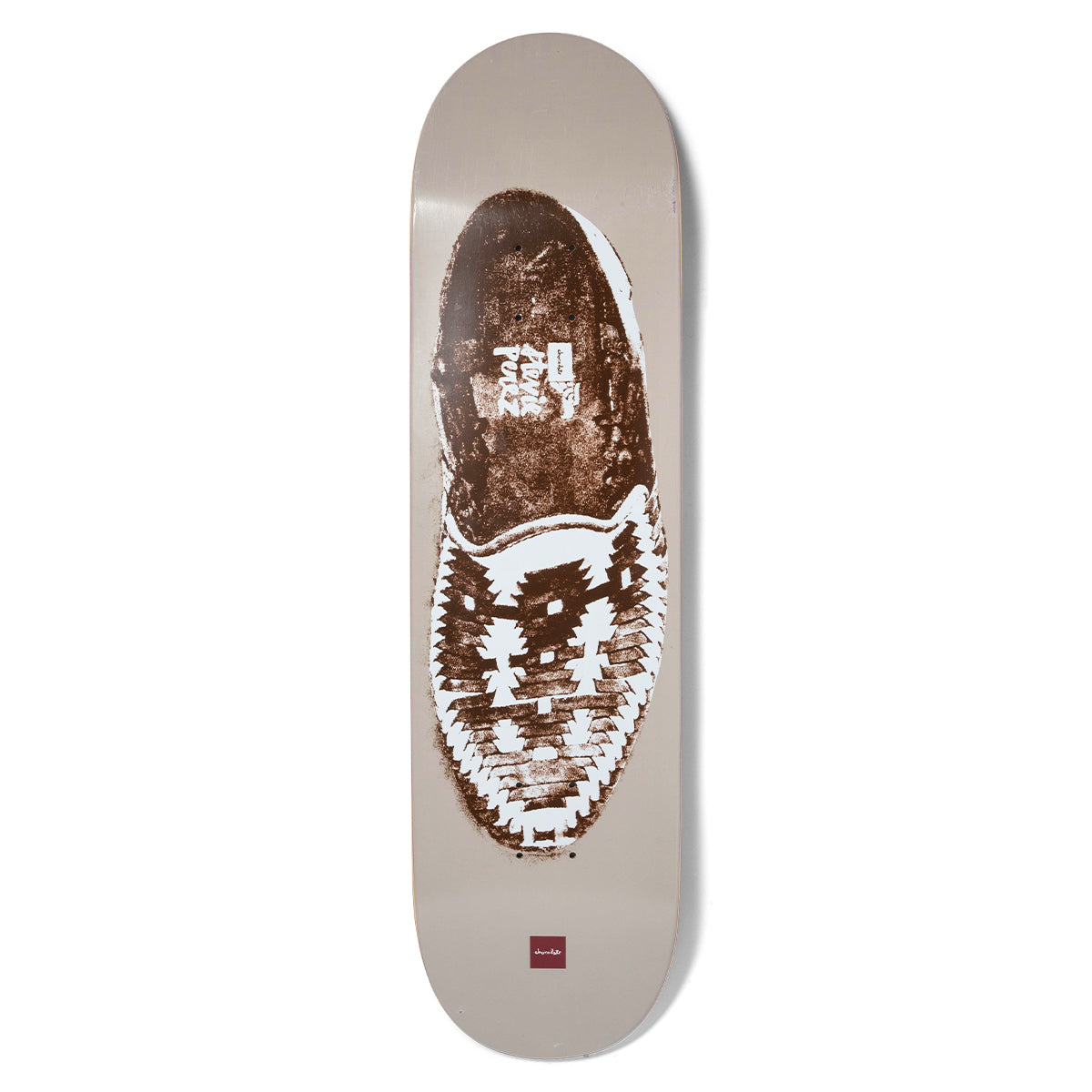 Chocolate Perez La Chankla skateboard deck: Taupe deck with a large brown and white printed sole and woven upper of a huarache sandal. Chocolate logo at the tail, and Adrian Perez-style text printed across the sole.