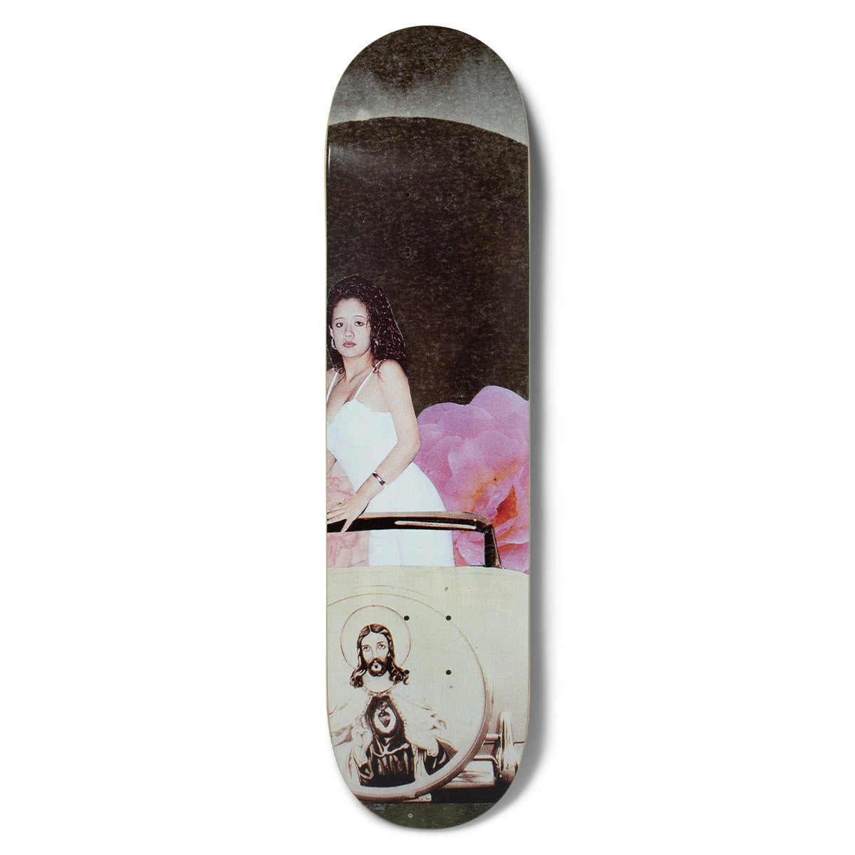 Chocolate Perez Quince skateboard deck: Collage-style photograph of a young woman in a white dress standing in an open-top car beside a large pink flower, with a halo-framed image of Jesus on the car door and a dark curved sky above.