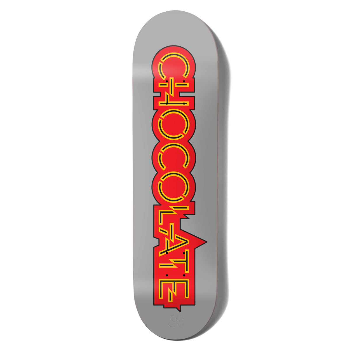 Chocolate Trahan Parliament Pop Secret skateboard deck: The word CHOCOLATE stacked vertically in large red block letters with yellow circuit-like outlines, on a plain grey deck.