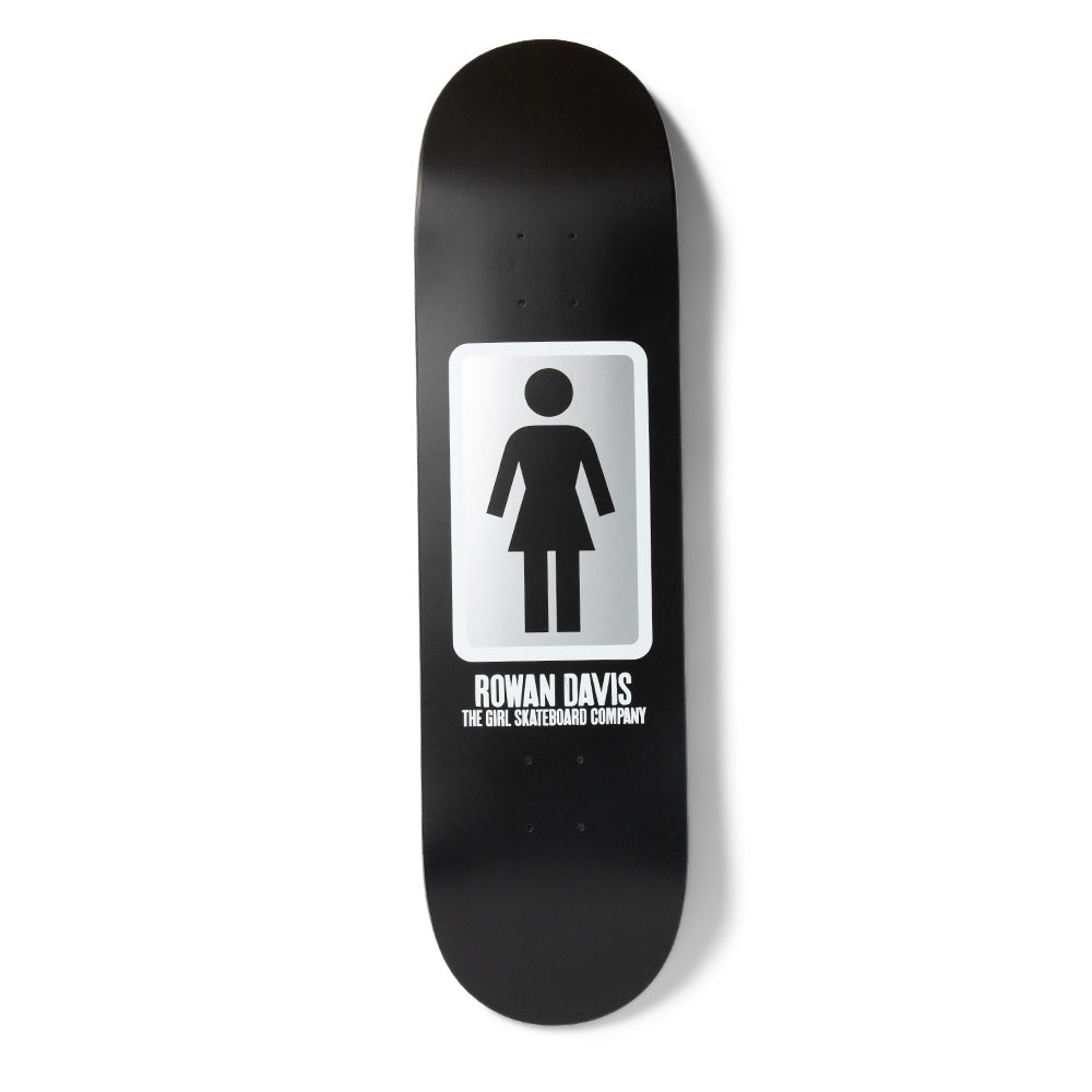 Girl Davis OG Black & White skateboard deck: The Girl logo figure in black on a silver-gradient rounded rectangle, on an all-black deck, with the rider name and company line in white capitals beneath.