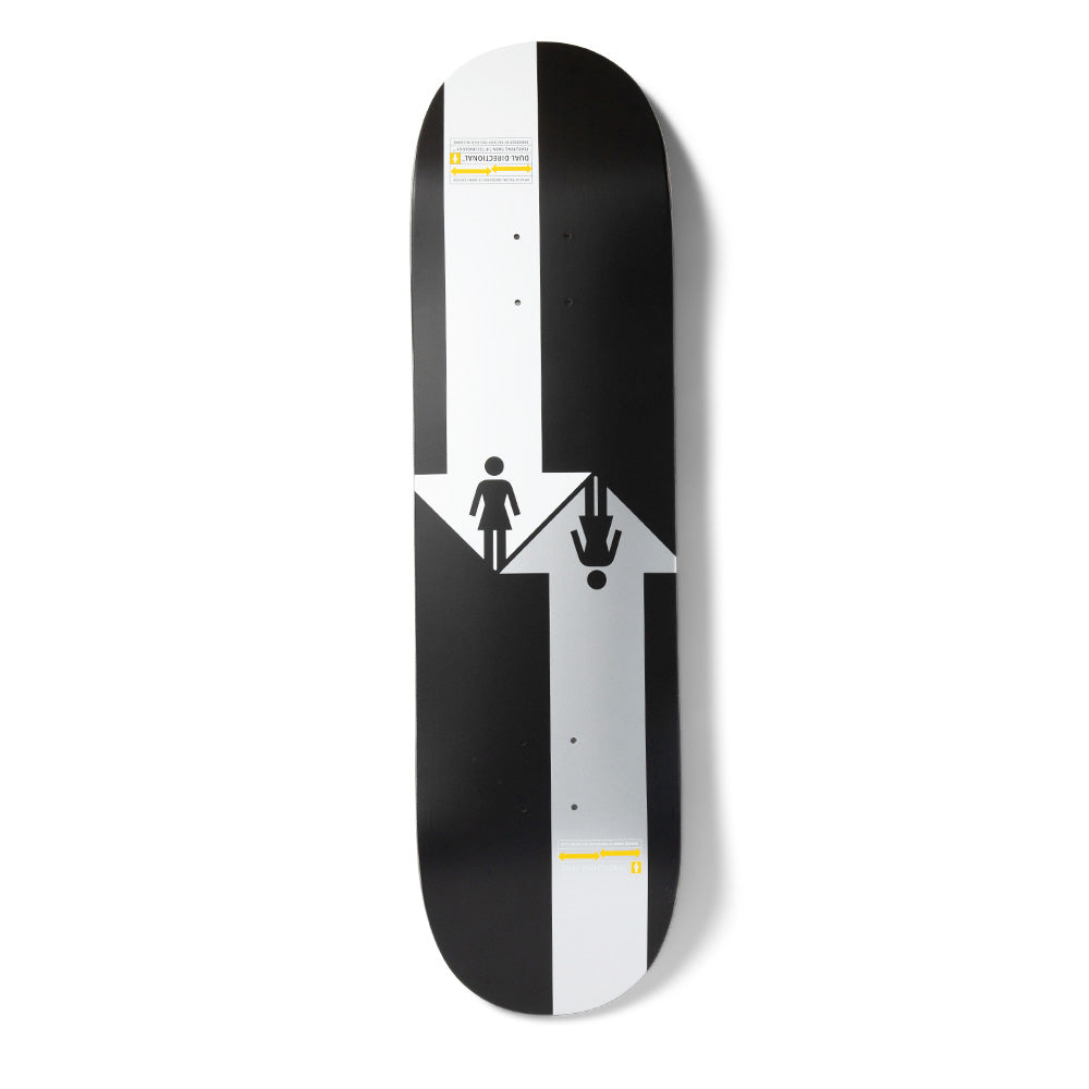 Girl Mccrank Dual Directional skateboard deck: Black deck with two large arrows made of white and silver stripes, one pointing down and one up, each containing a Girl logo figure, one upright and one upside down, with small yellow road-sign style text panels.