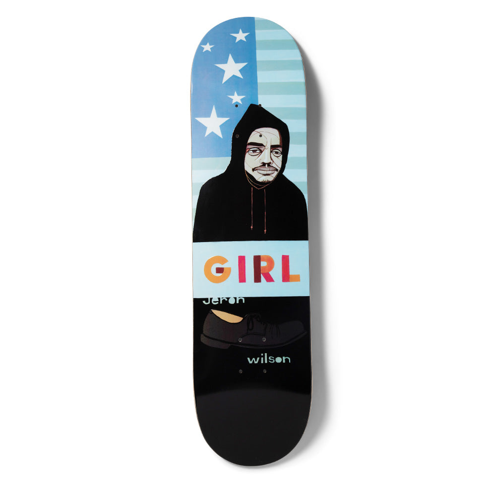 Girl Wilson Hecox Portrait skateboard deck: A painted portrait of a hooded man with a stubbled face stands before a pale blue stars-and-stripes flag, above a Girl banner in multicoloured letters and a black dress shoe, on a black deck.
