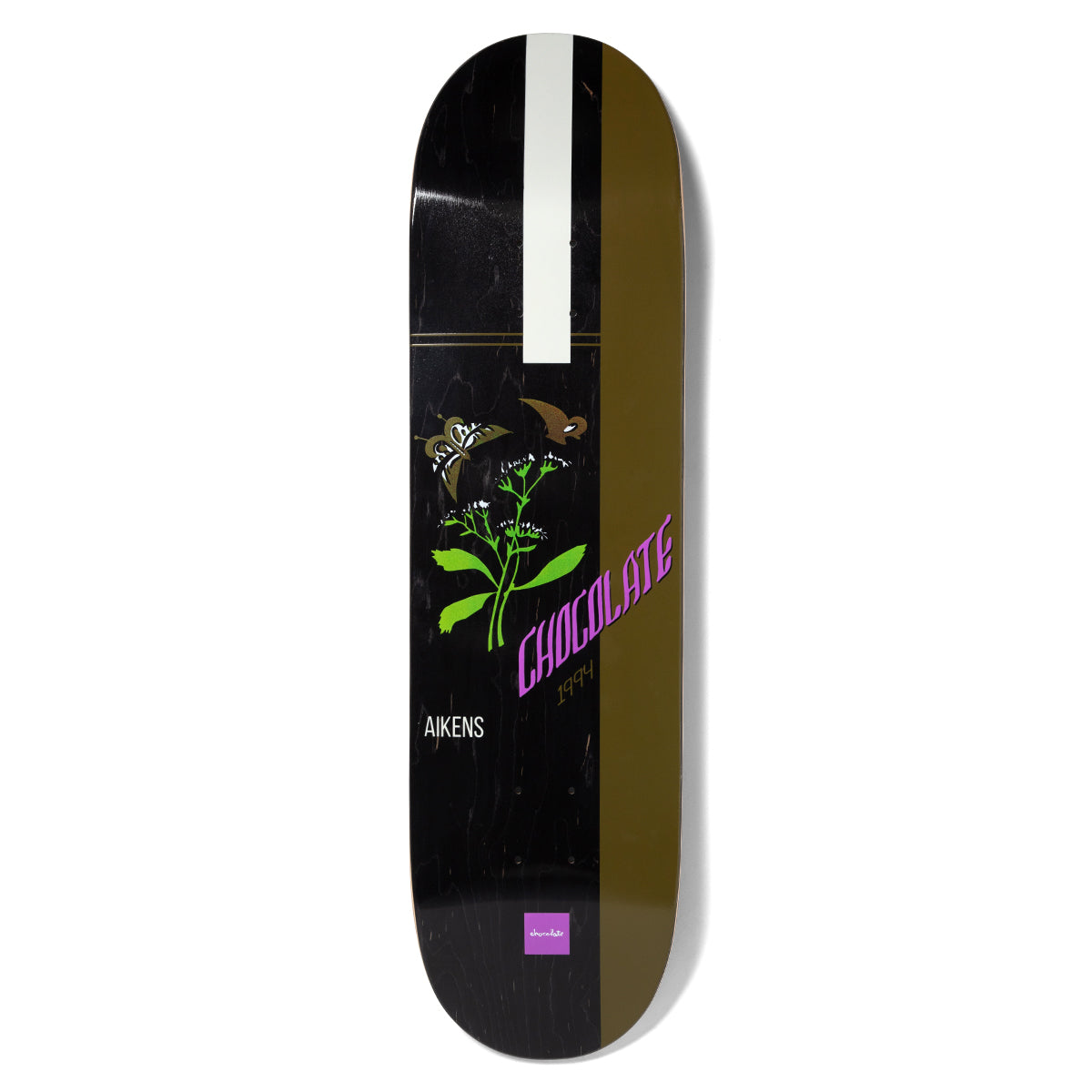 Chocolate Aikens Burn One Pop Secret skateboard deck: Black deck with an olive-brown stripe down the right and a white stripe at the top, with a green plant bearing white flowers and two moths, and Chocolate lettering in purple.