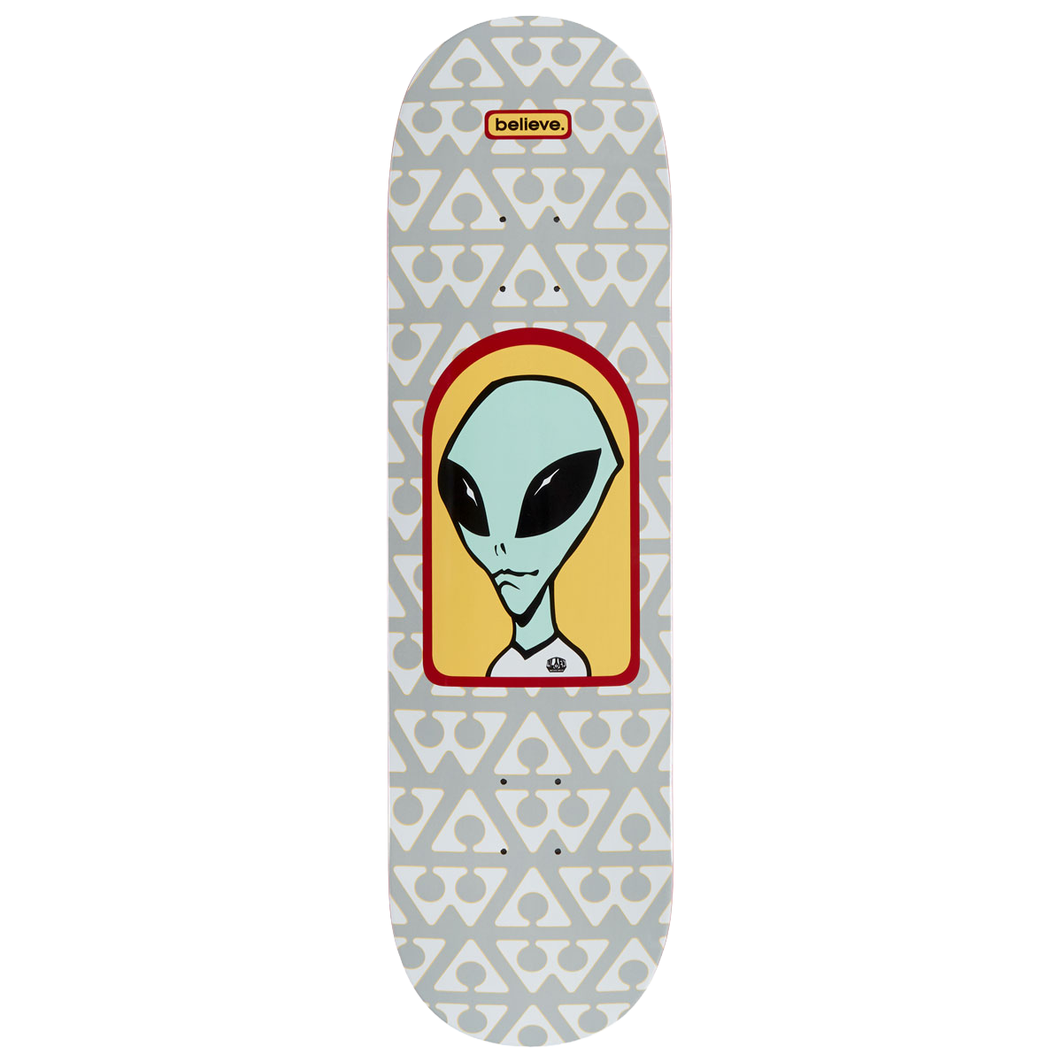 Alien Workshop Believe Pattern Grey skateboard deck: Alien head with large black eyes inside a red and yellow arched frame, over a grey and white repeating pattern of triangle and circle symbols. A small red believe. tag sits near the nose.